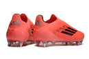 ADIDAS F50 + SG ELITE 2025 TRAVA MISTA