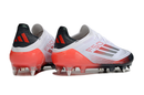 ADIDAS F50 + SG ELITE 2025 TRAVA MISTA