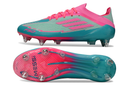 ADIDAS F50 + SG ELITE 2025 TRAVA MISTA