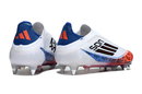 ADIDAS F50 + SG ELITE 2025 TRAVA MISTA