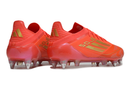 ADIDAS F50 + SG ELITE 2025 TRAVA MISTA
