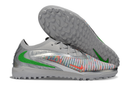 CHUTEIRA SOCIETY NIKE PHANTOM REACTX 6 PRO TF CINZA/PRATA/VERDE (PRONTA ENTREGA)