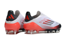 ADIDAS F50 + SG ELITE 2025 TRAVA MISTA