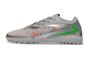 CHUTEIRA SOCIETY NIKE PHANTOM REACTX 6 PRO TF CINZA/PRATA/VERDE (PRONTA ENTREGA)