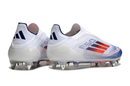 ADIDAS F50 + SG ELITE 2025 TRAVA MISTA